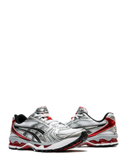 Asicss gel kayano orange and gruy